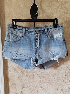 Levi distressed button fly jean shorts